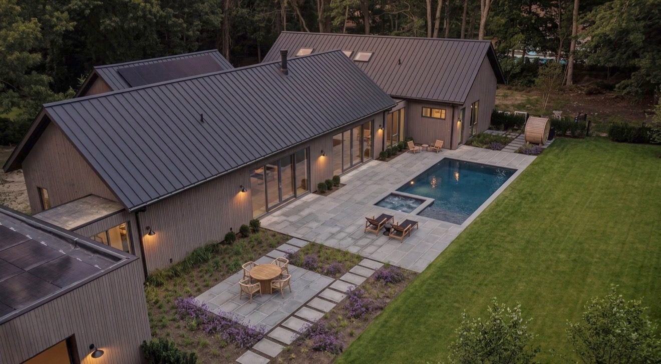 6 Great Circle, the completed house, terrace and pool seen from above the garden